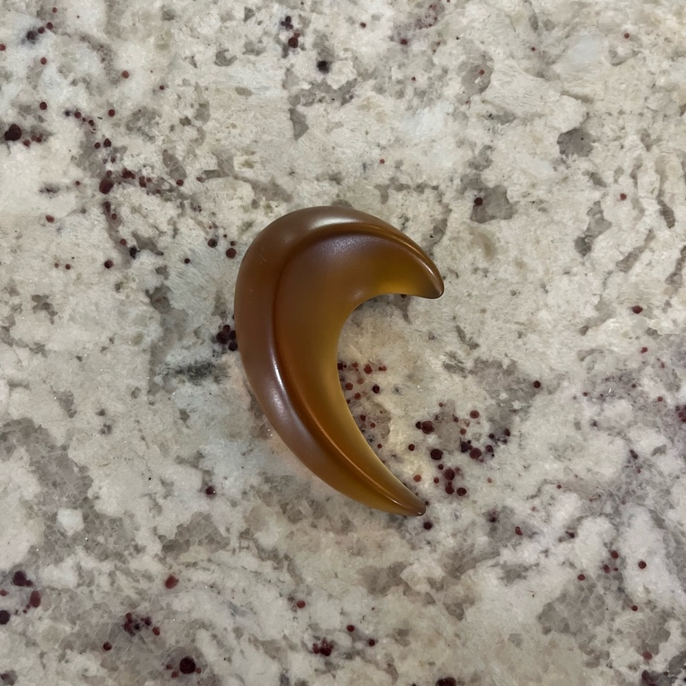 Crescent brooch